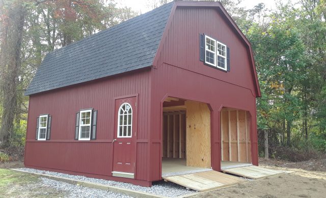 large red two story barn garage